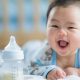 Asian baby with bottle